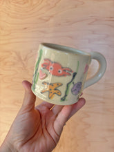 Load image into Gallery viewer, Otter Cuddle Mug #1

